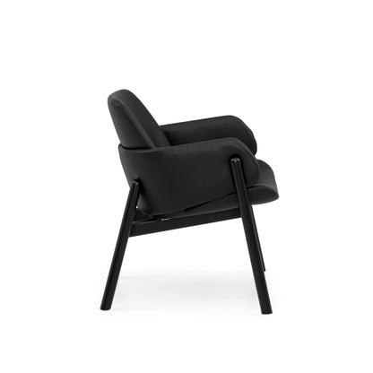 ABOVE Armchair in Black finish and Black leather