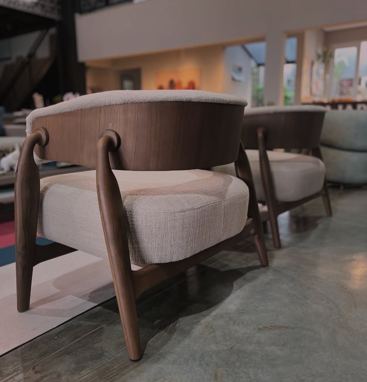 Wooden chair with cushioned seat in a modern interior setting