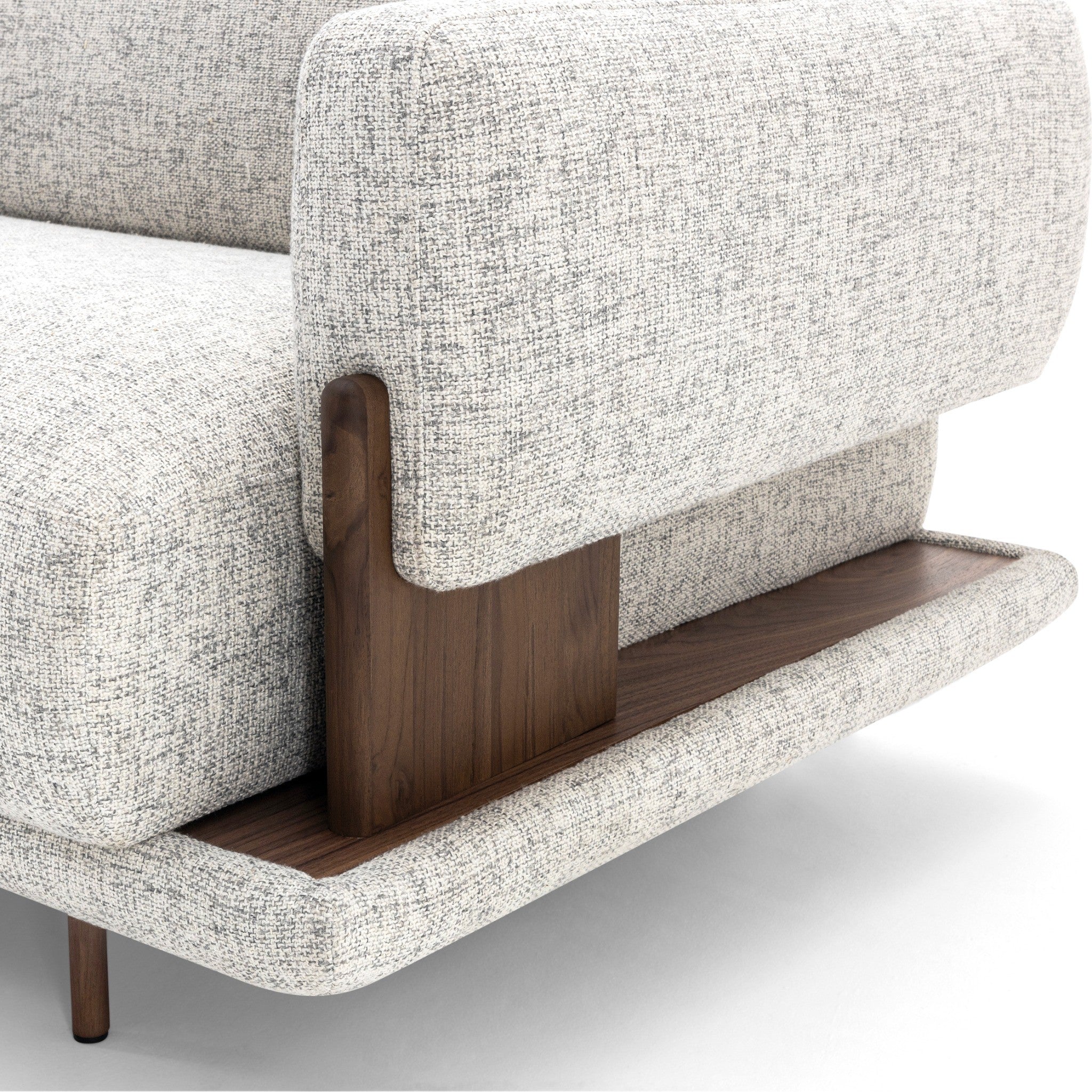 Gray upholstered sofa with wooden armrests on a white background