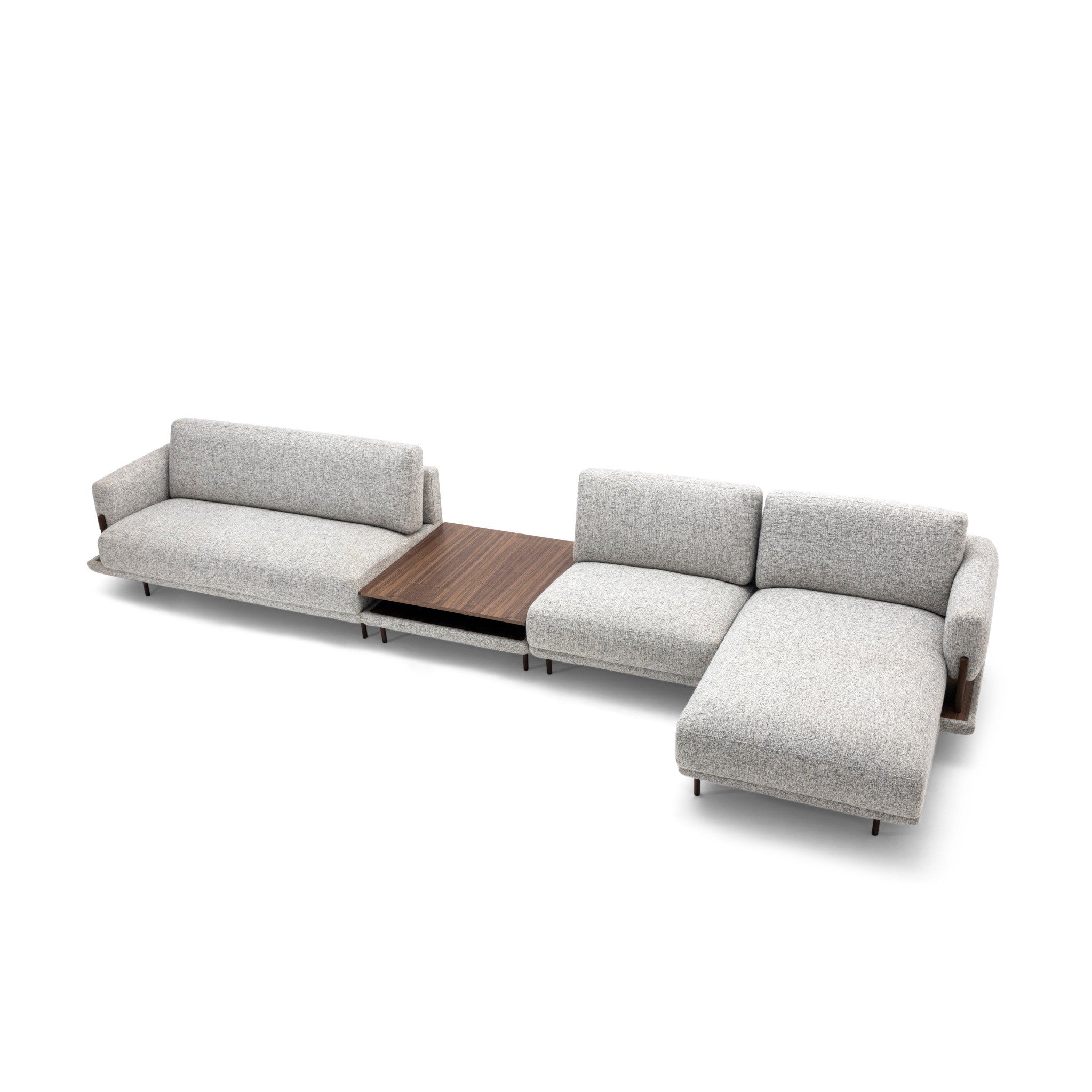 A modern modular sectional sofa in light gray textured fabric with a central dark brown wood coffee table insert, shown on a clean white background.