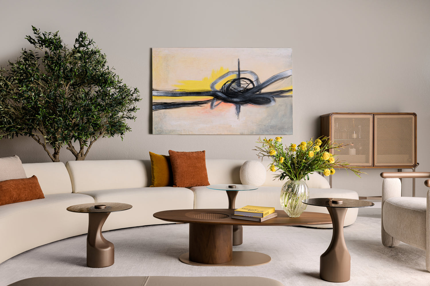 Modern living room with a white sofa, coffee table, and decorative elements.