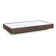 Wooden coffee table with glass top on a white background