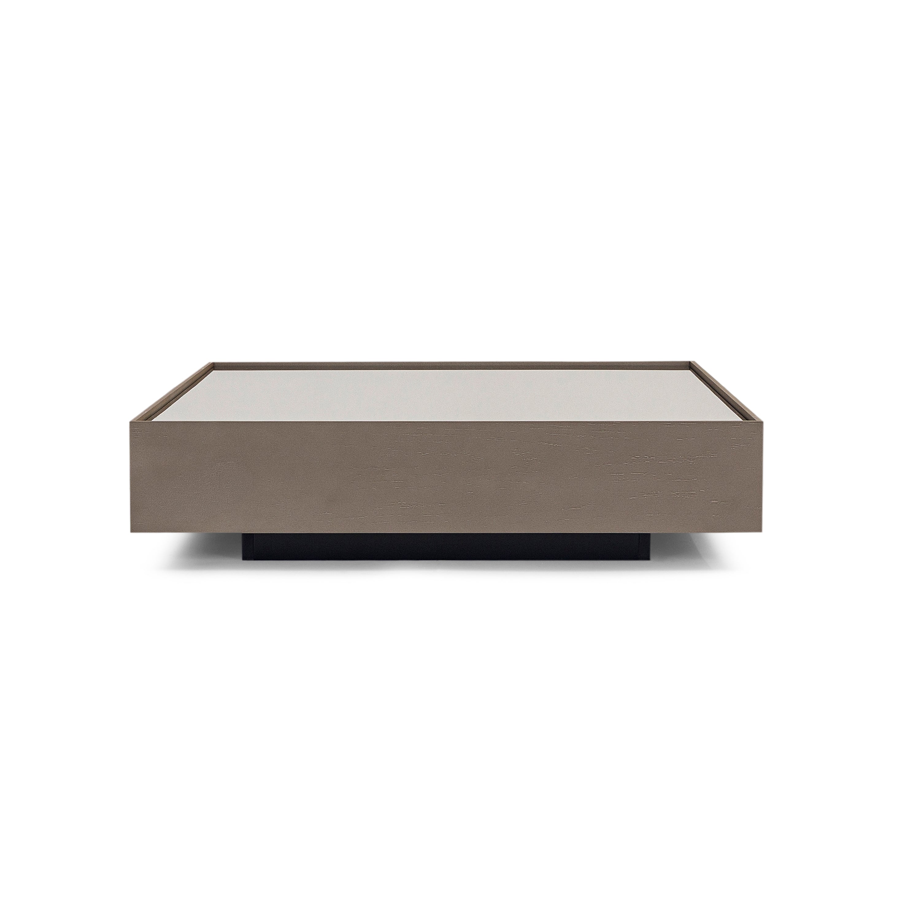 Rectangular coffee table with a beige top and black base on a white background