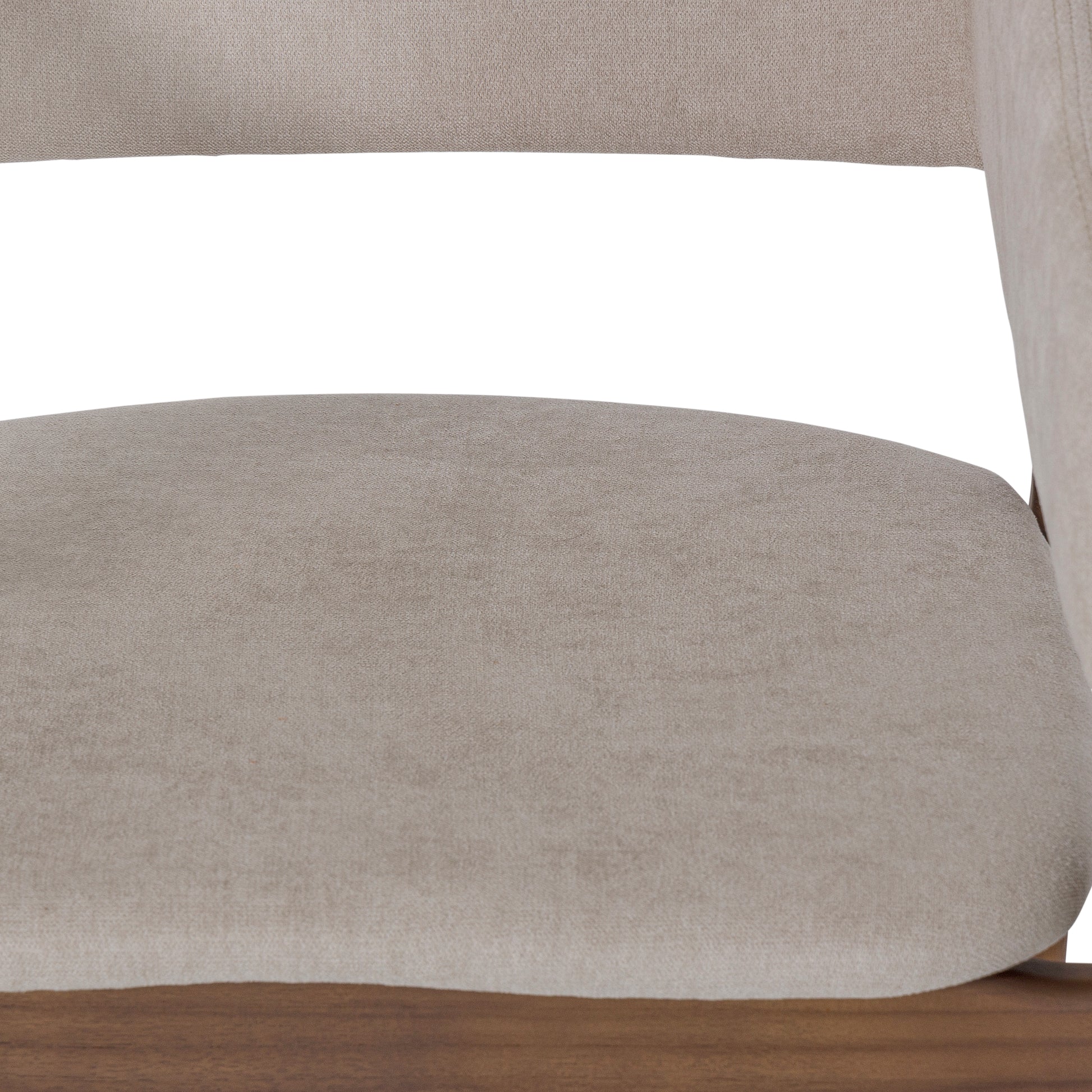 Close-up of a beige upholstered chair with a wooden base on a white background