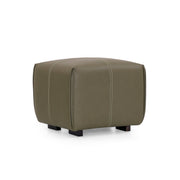 Brown leather ottoman on a white background