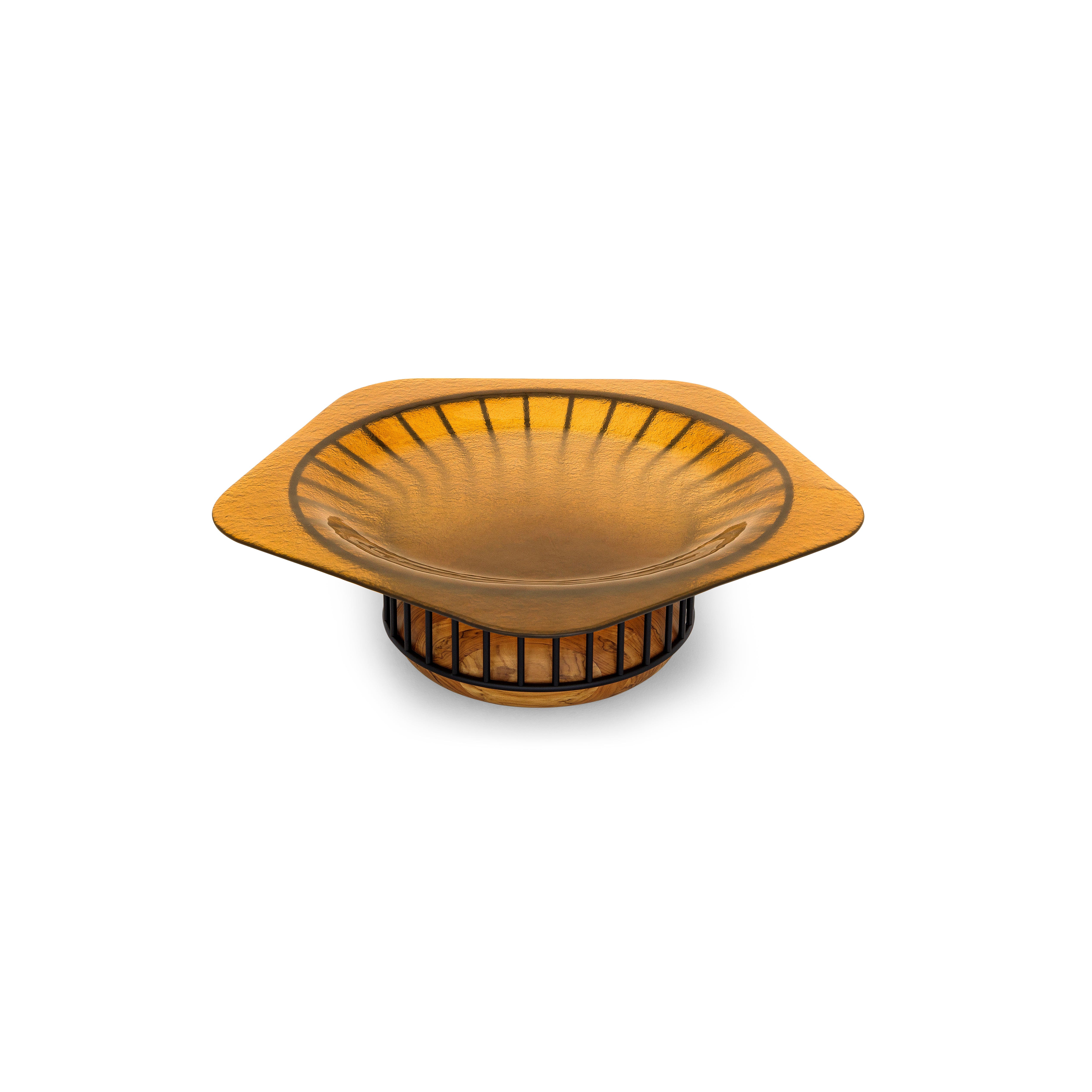 An amber-colored glass bowl with a sunburst ribbed pattern and a matching tiered base, set against a plain white background.