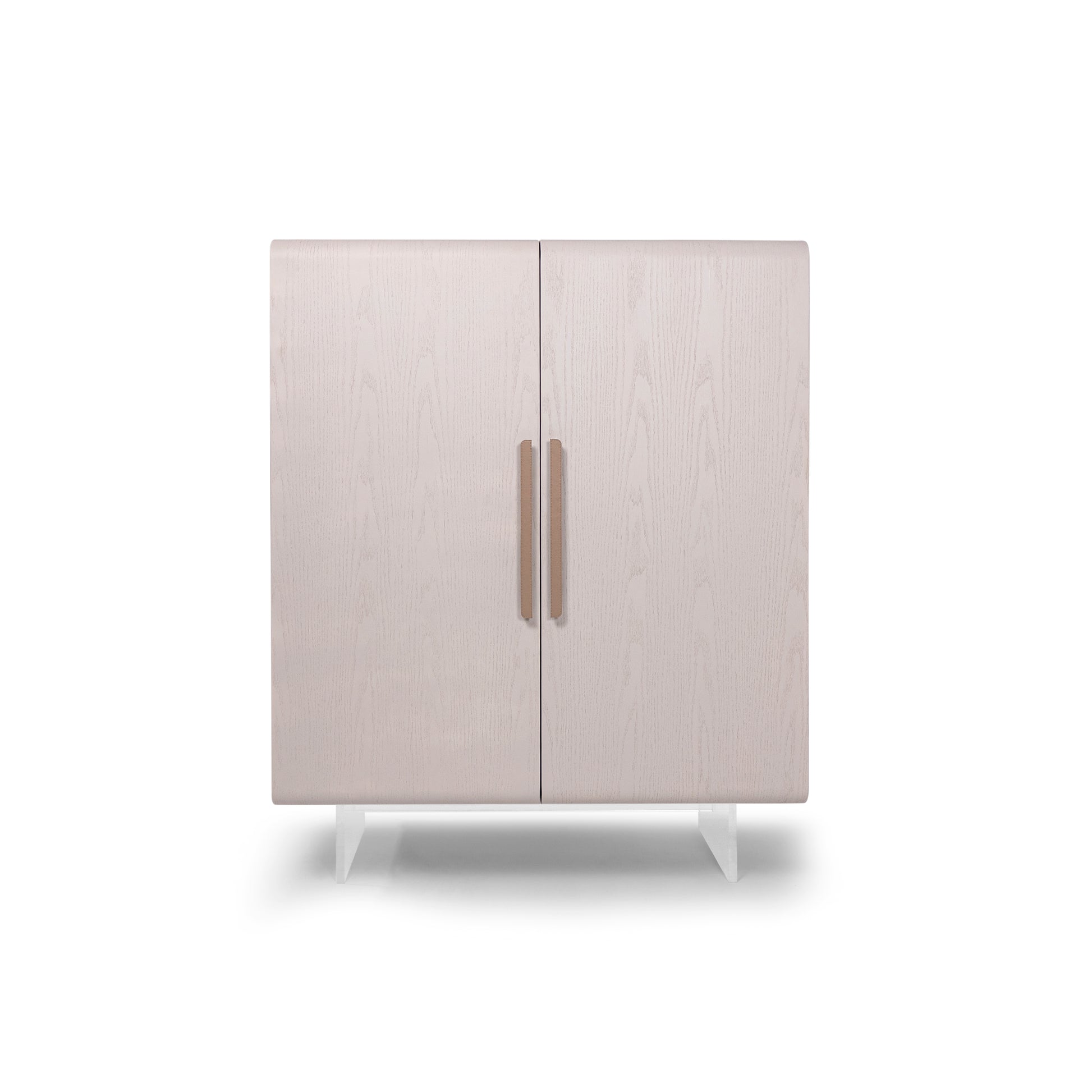 Light gray cabinet with two doors and bronze handles on a white background