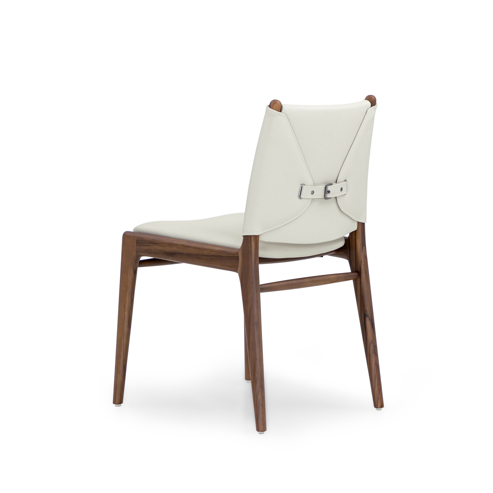Dining chair with white cushioned seat and backrest on a white background
