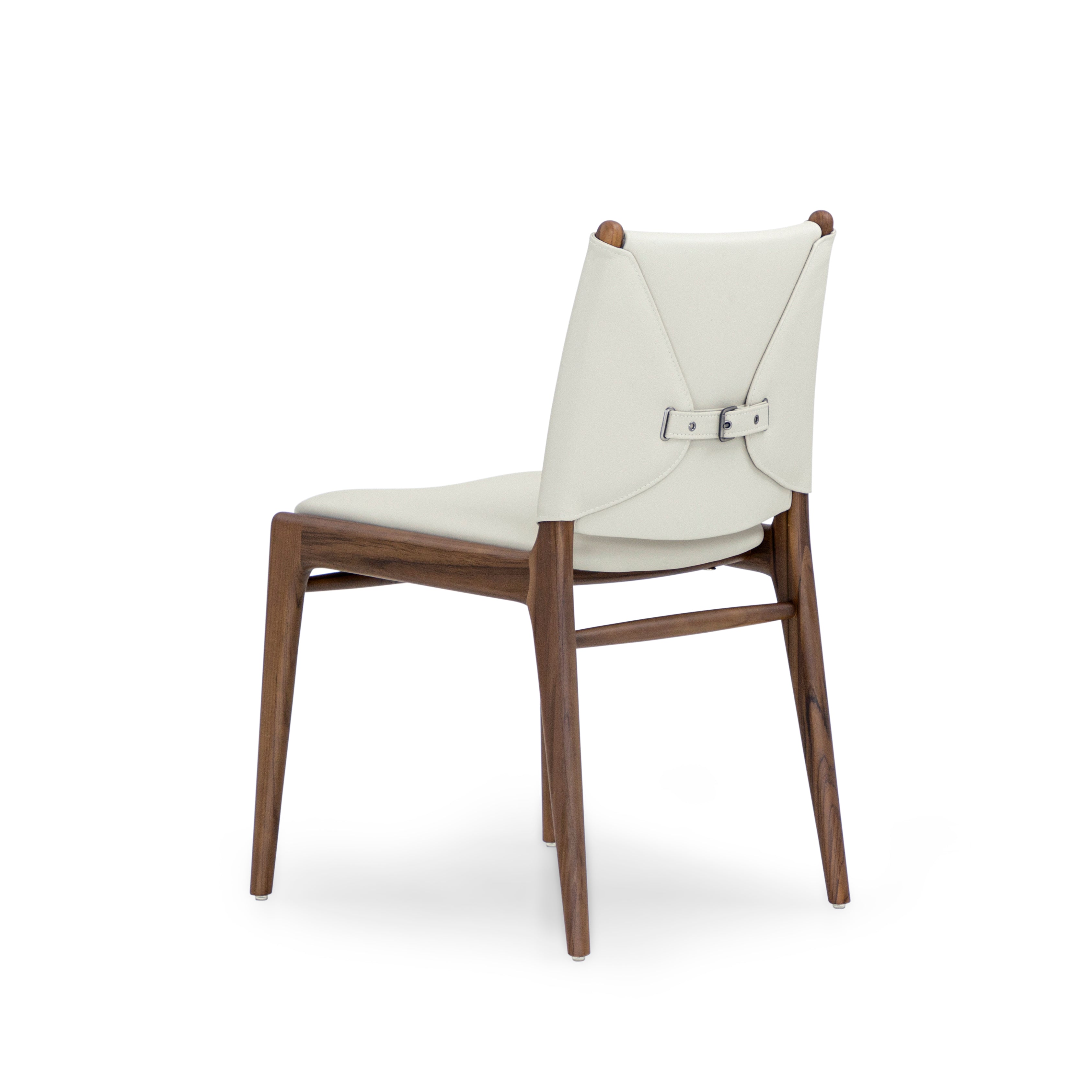 Dining chair with white cushioned seat and backrest on a white background