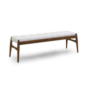 Wooden bench with white cushion on a white background