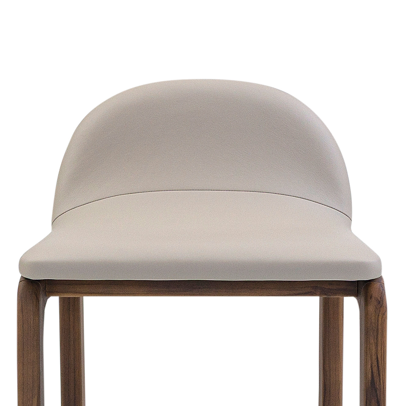 Chair with a beige cushioned seat and wooden legs on a white background