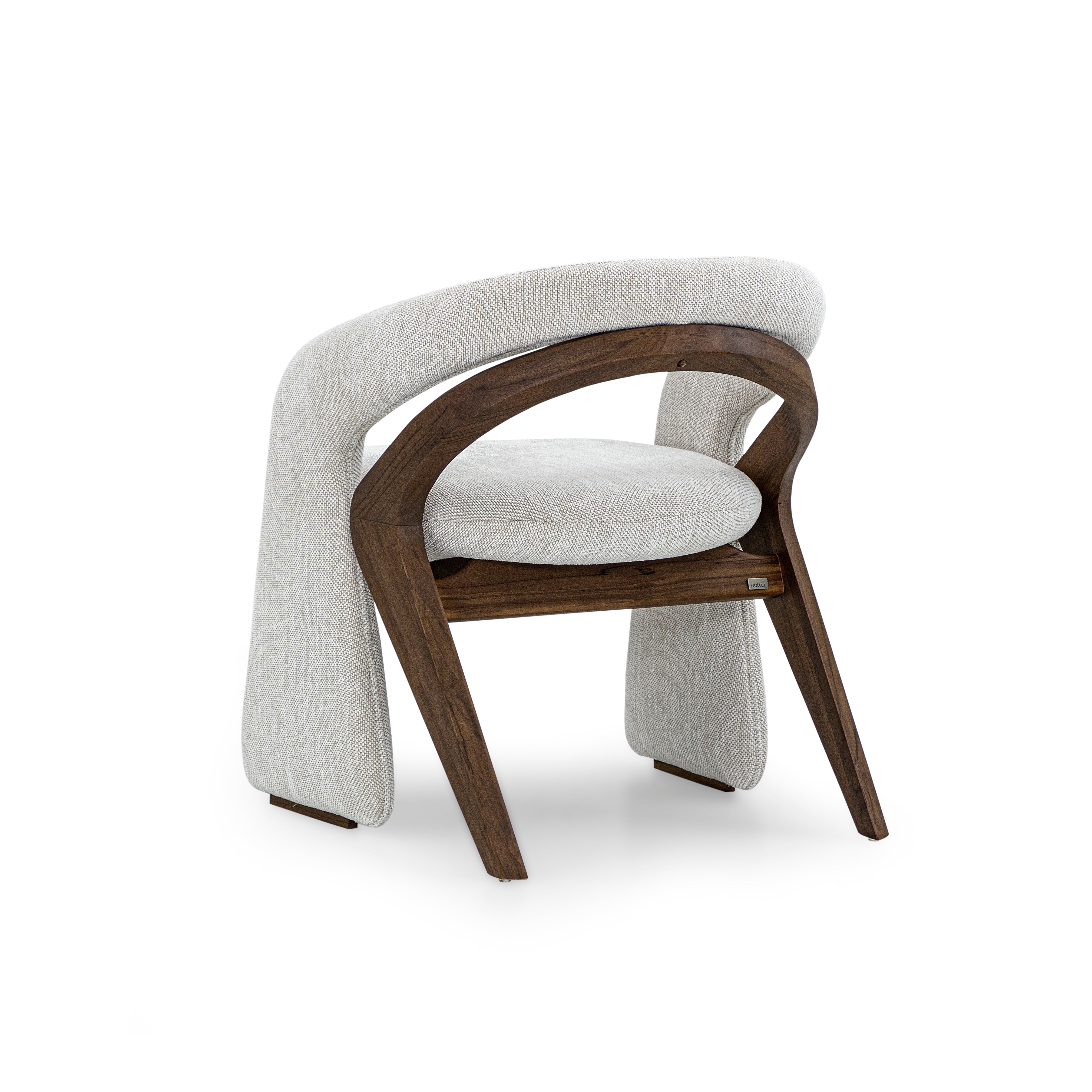 Modern chair with wooden frame and gray cushion on a white background