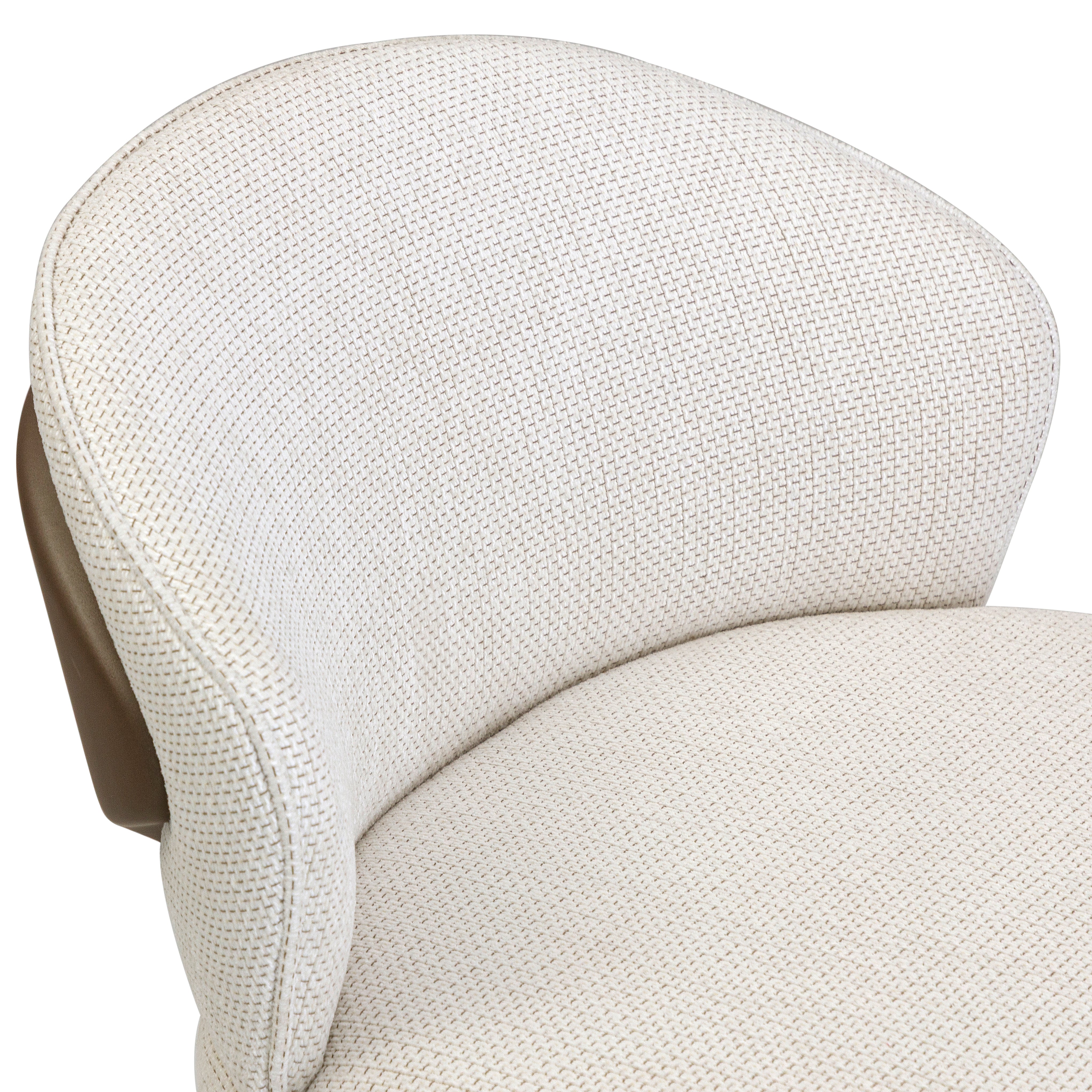 Close-up of a beige upholstered chair with a textured pattern on a white background