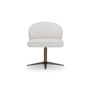 White upholstered chair with a dark metal base on a white background