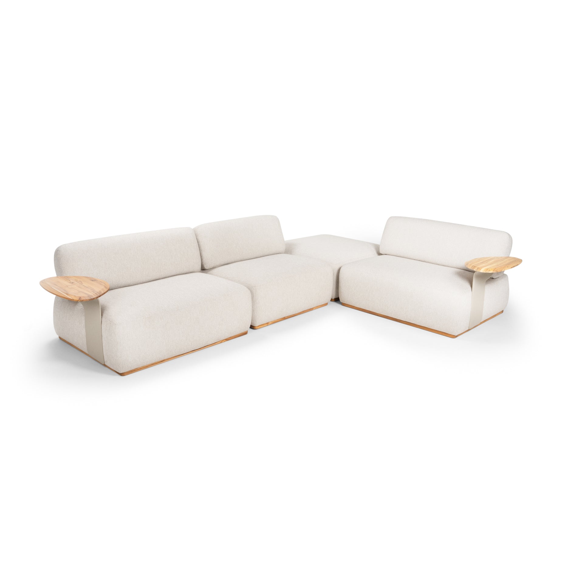A beige upholstered modular sofa with a wooden frame and attached side tables.