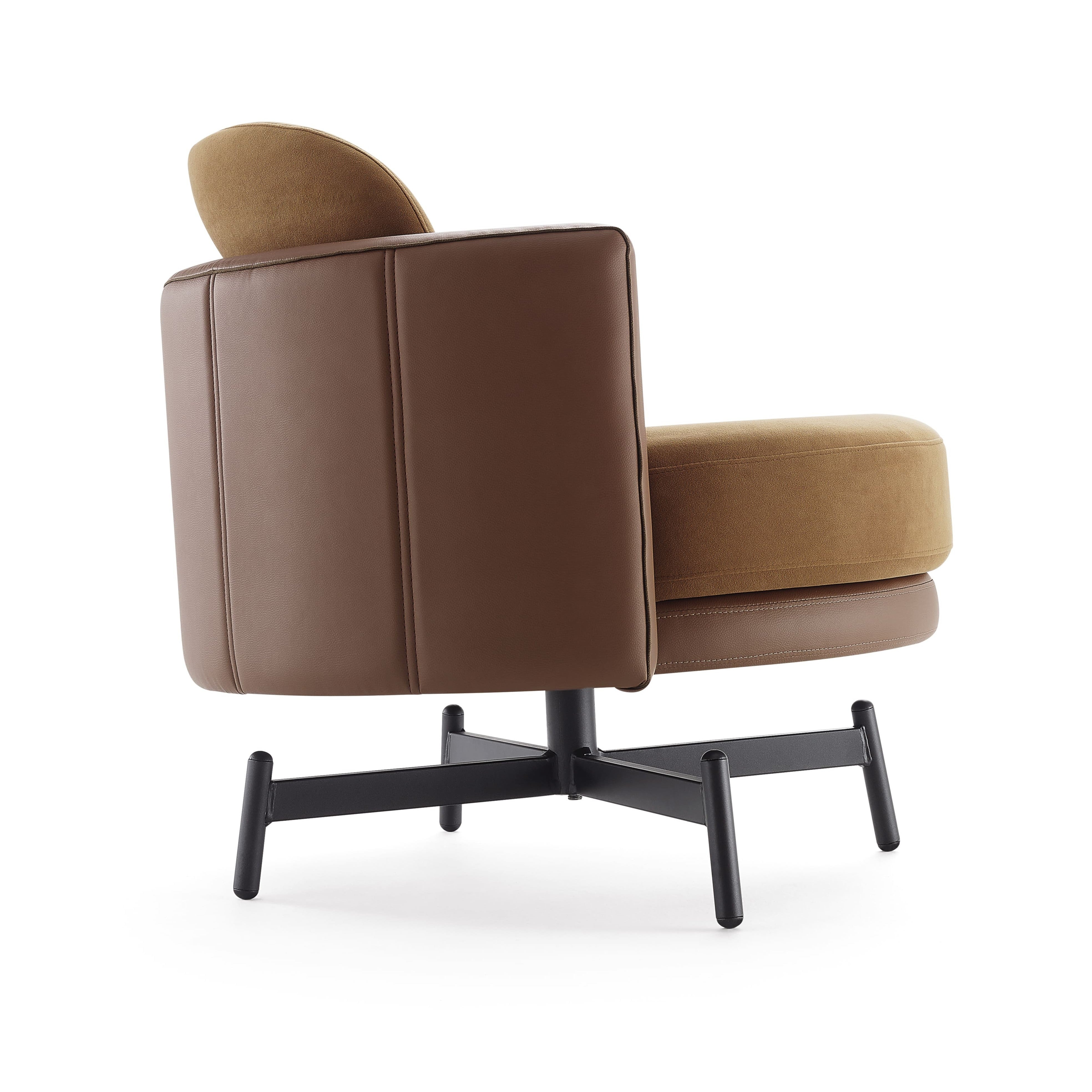 Brown armchair with a black metal base on a white background