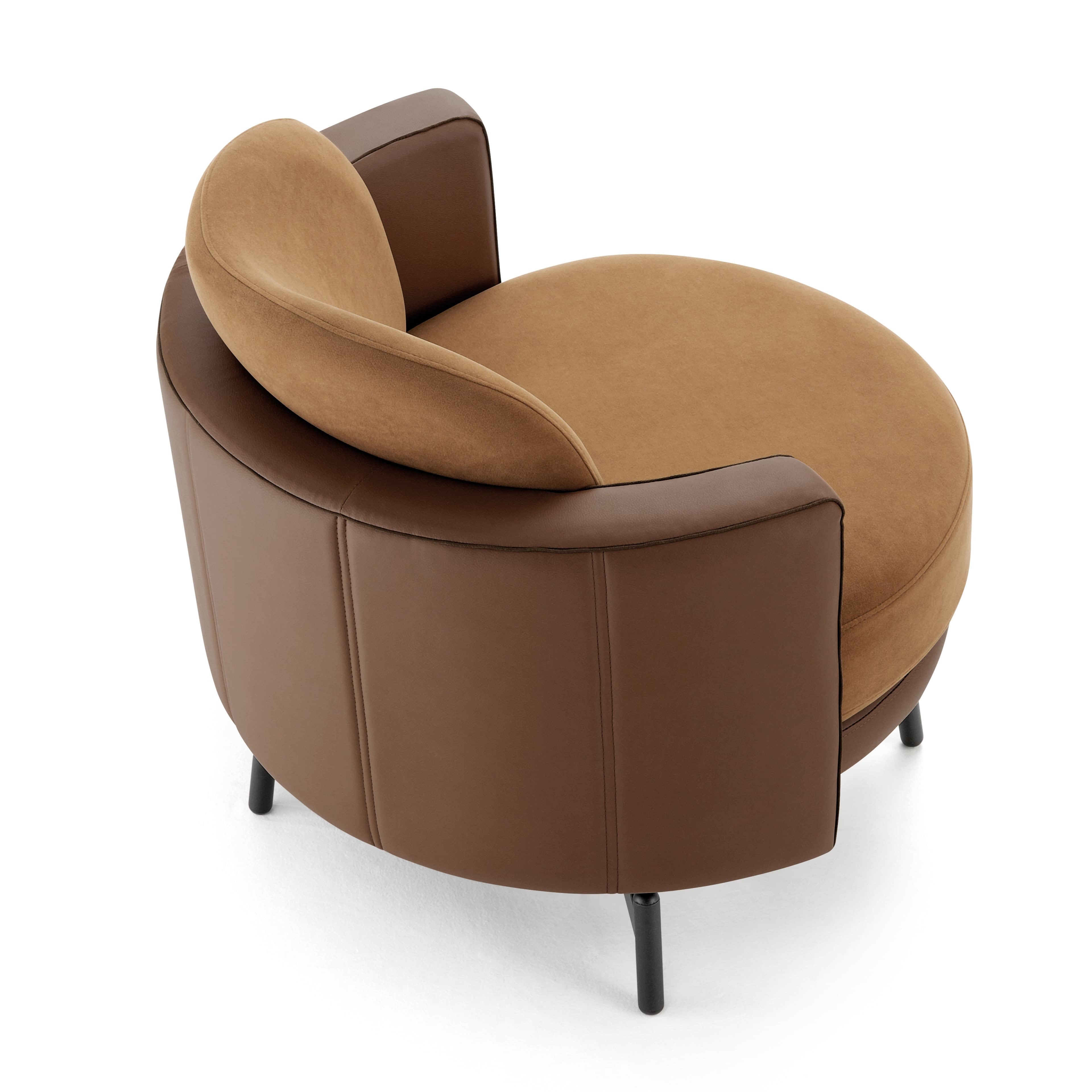 Brown armchair with curved design on a white background