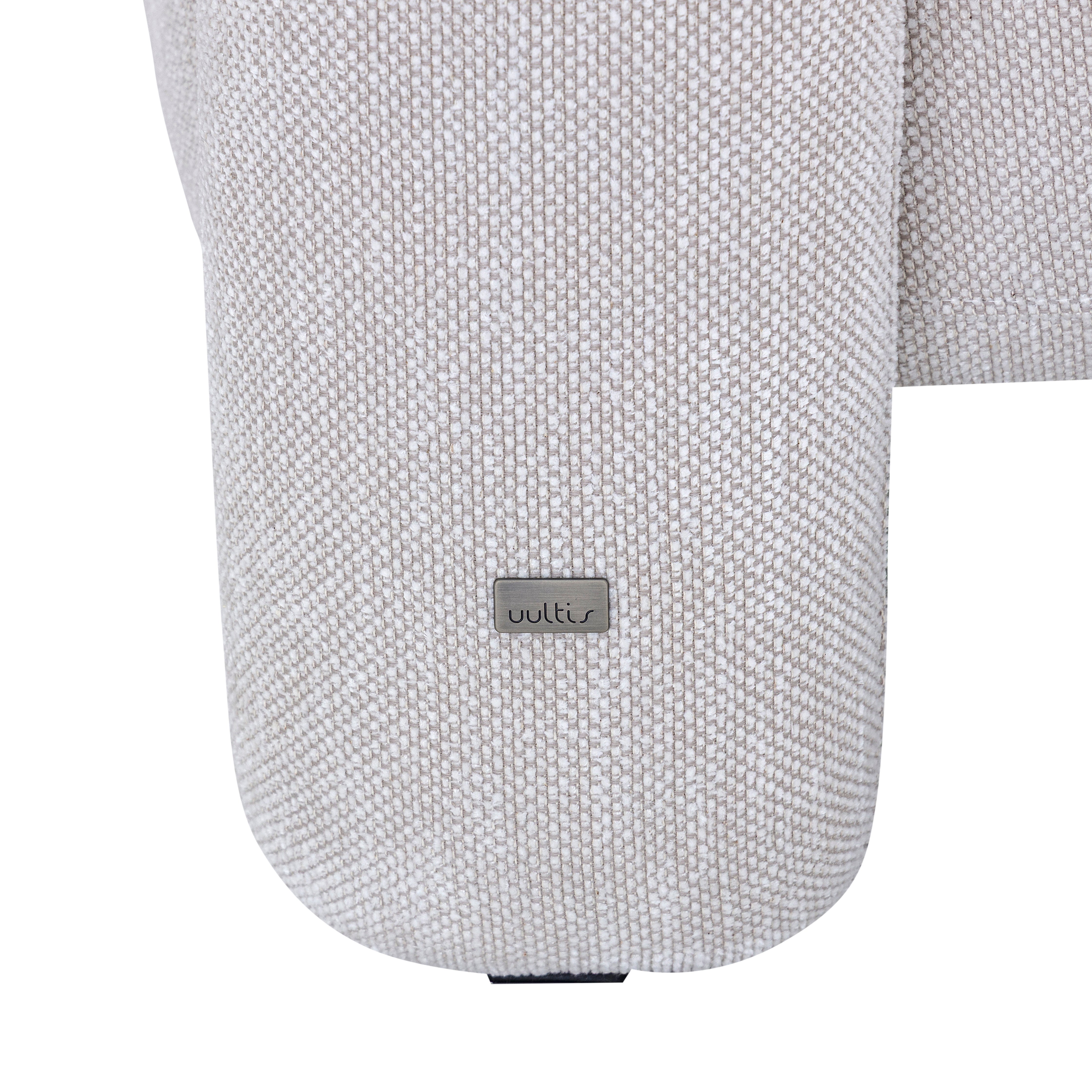 Gray textured fabric surface with a visible brand logo on a white background