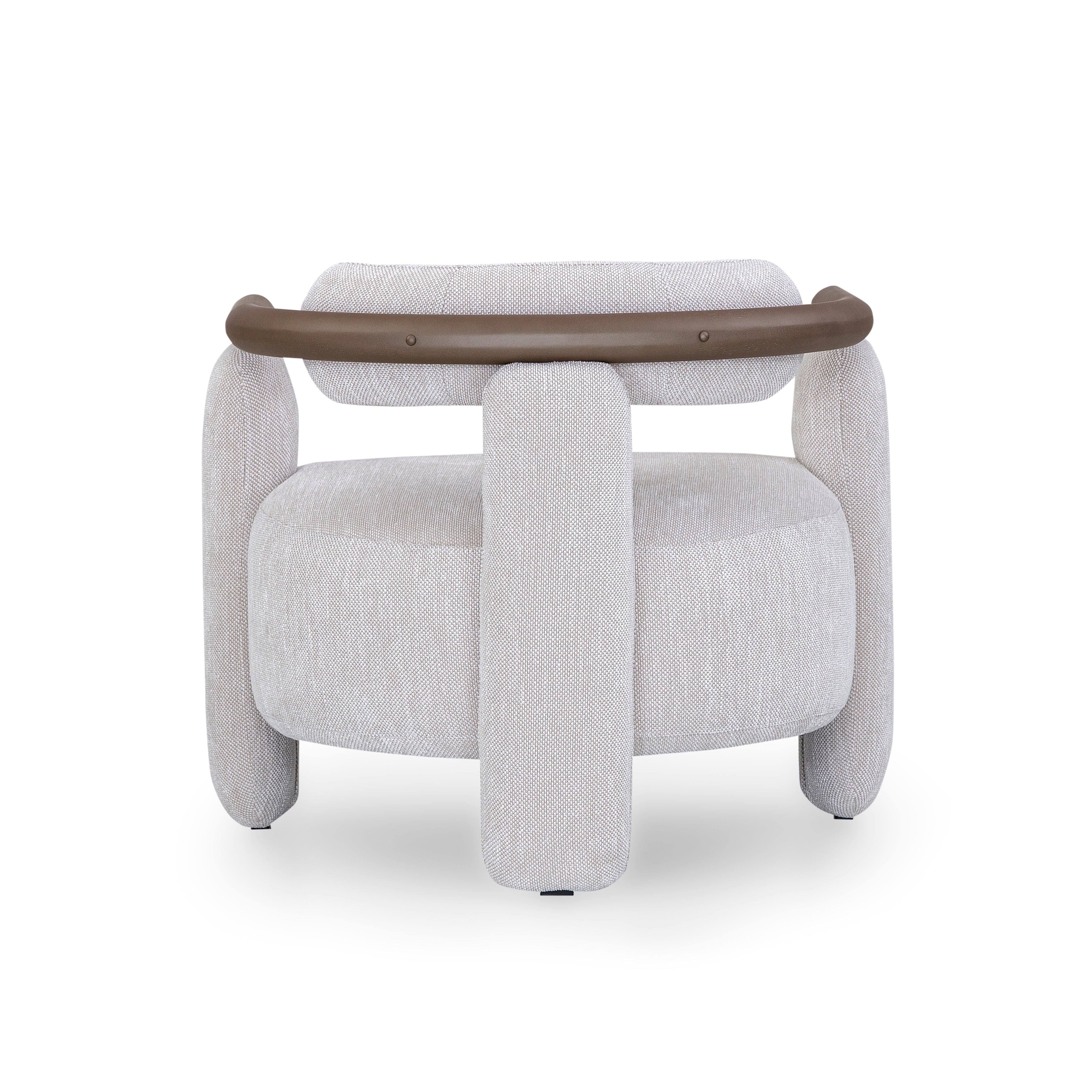 Gray armchair with a brown wooden armrest on a white background