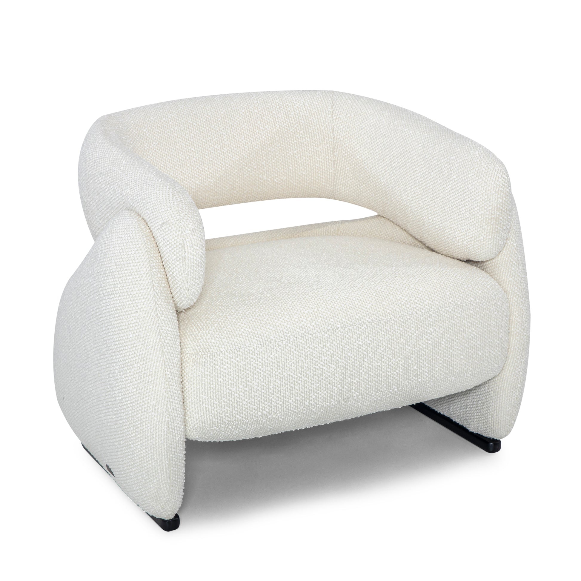 Modern white armchair with a unique, curved design on a white background