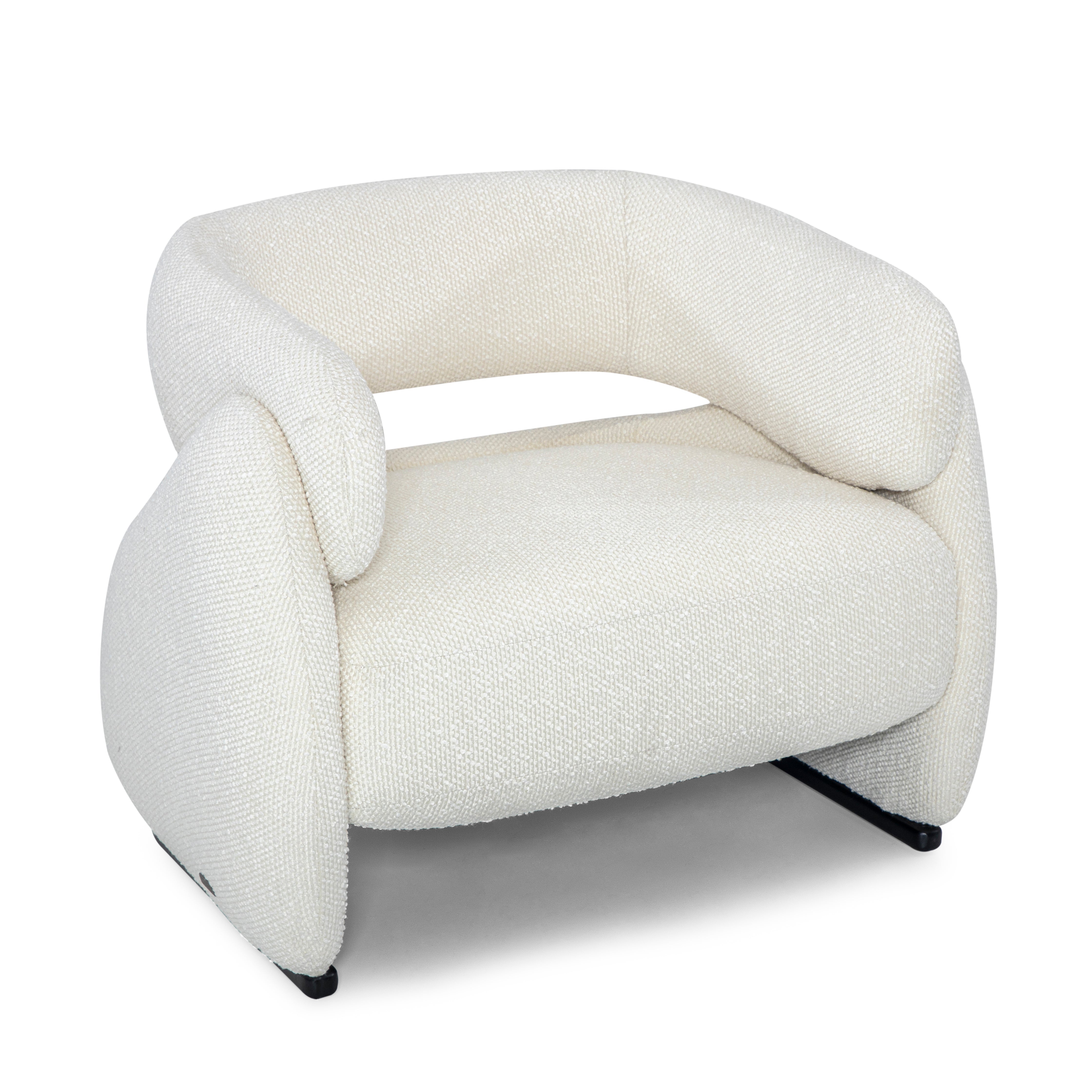 Modern white armchair with a unique, curved design on a white background