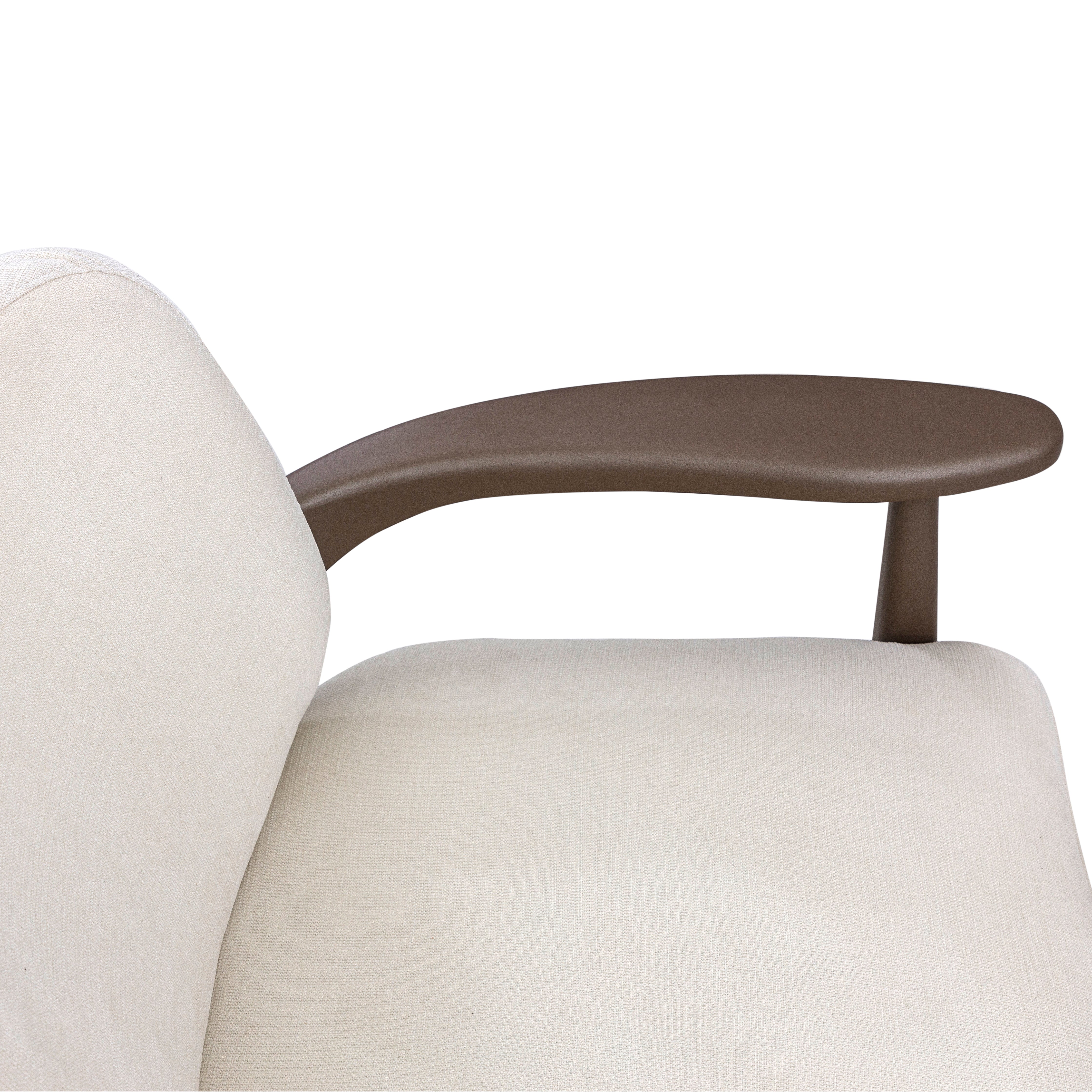 White sofa with a brown side table on a white background