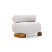 Modern chair with a cylindrical backrest and wooden legs on a white background