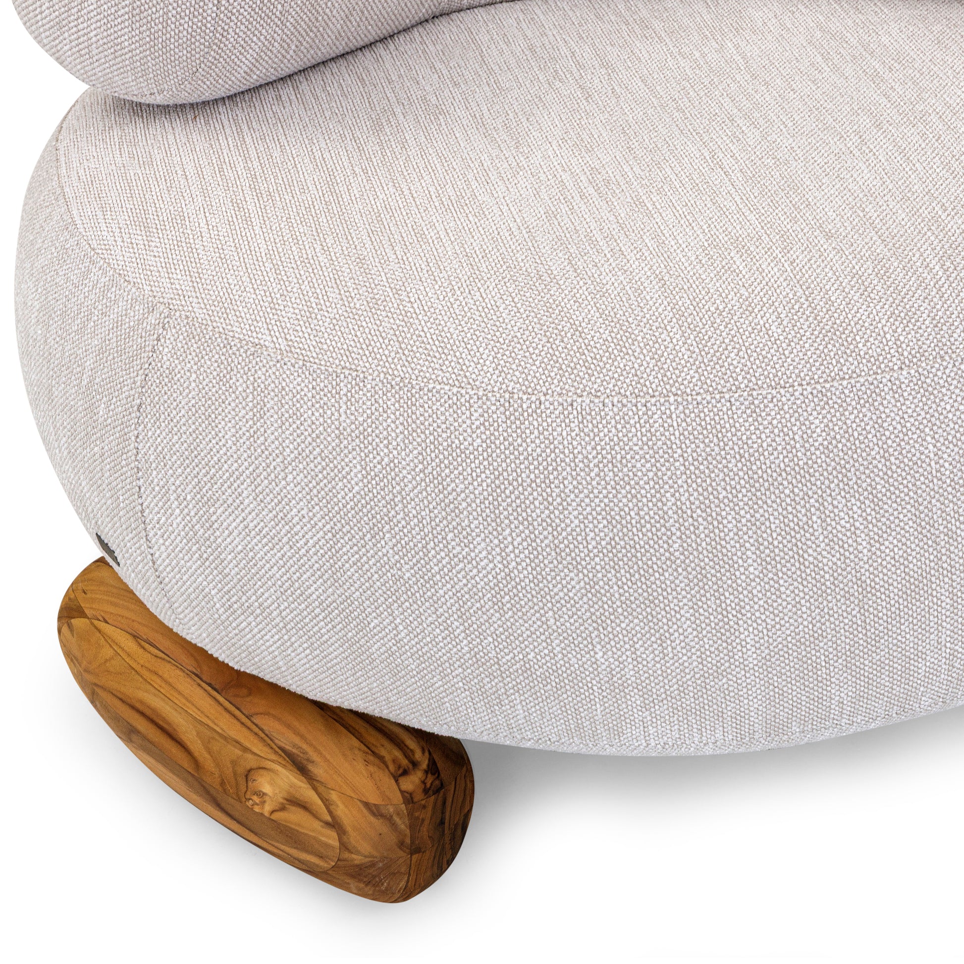 Gray upholstered ottoman with wooden legs on a white background