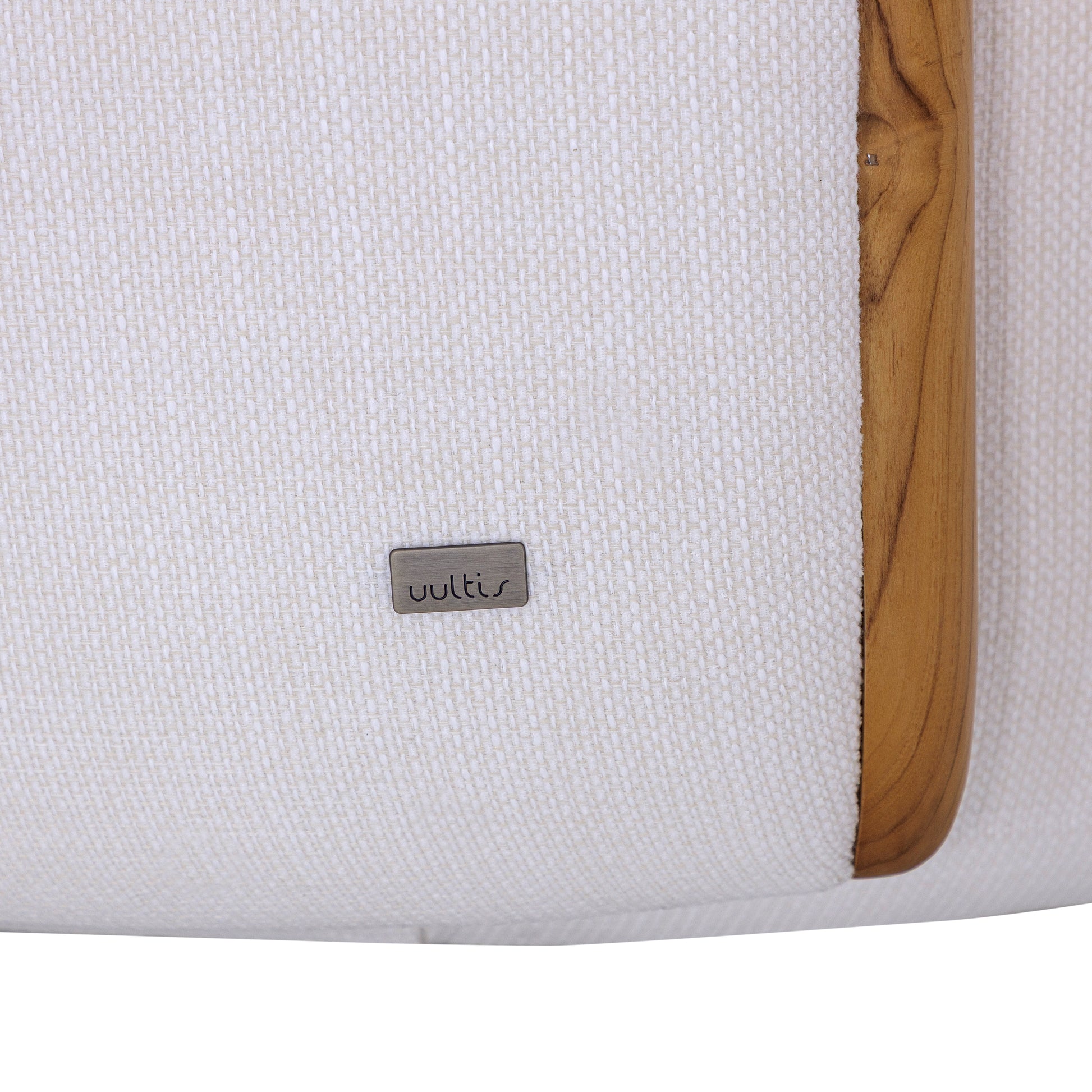 White cushion with a wooden border and 'woltus' brand label on a white background