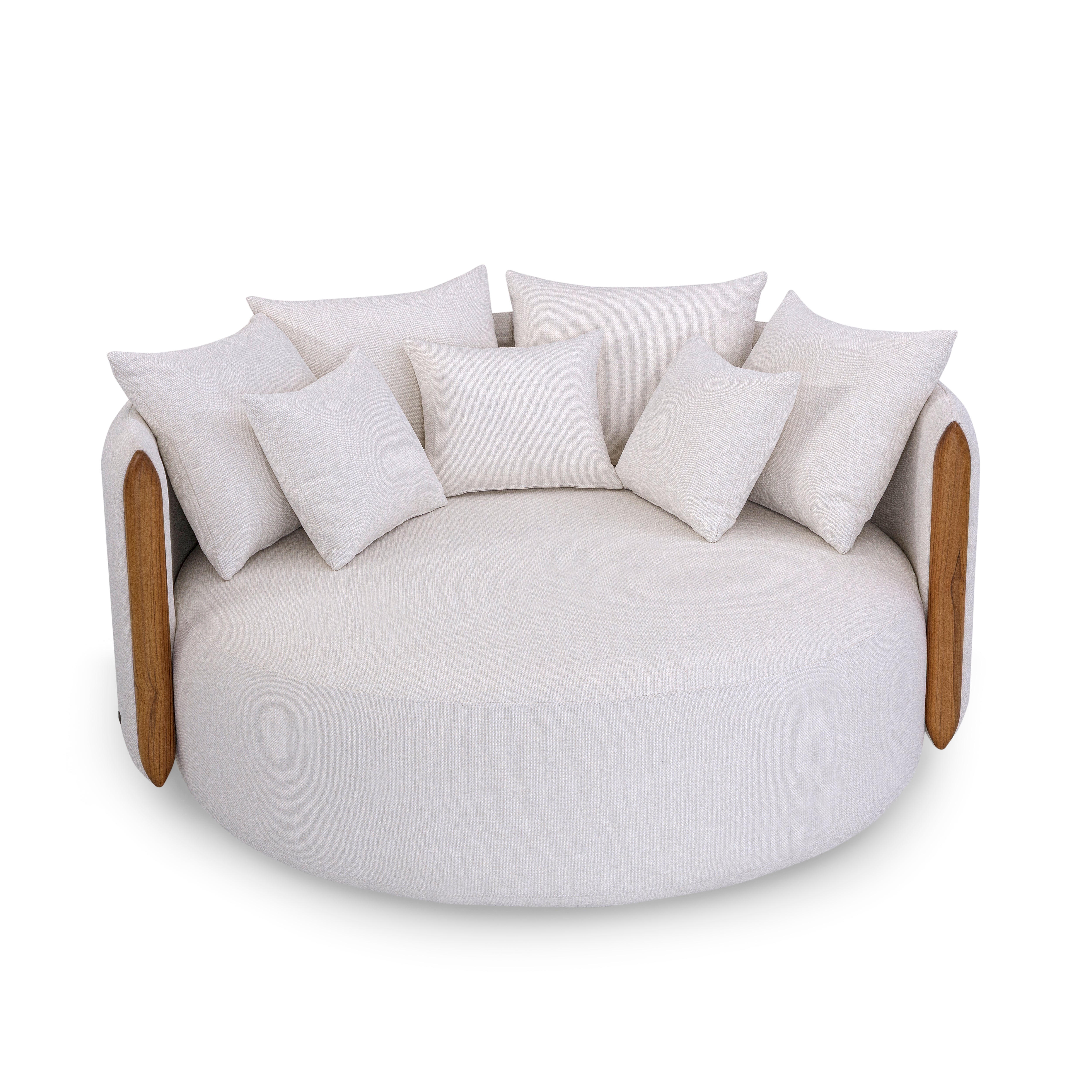 Round white cushion with wooden armrests and multiple pillows on a white background
