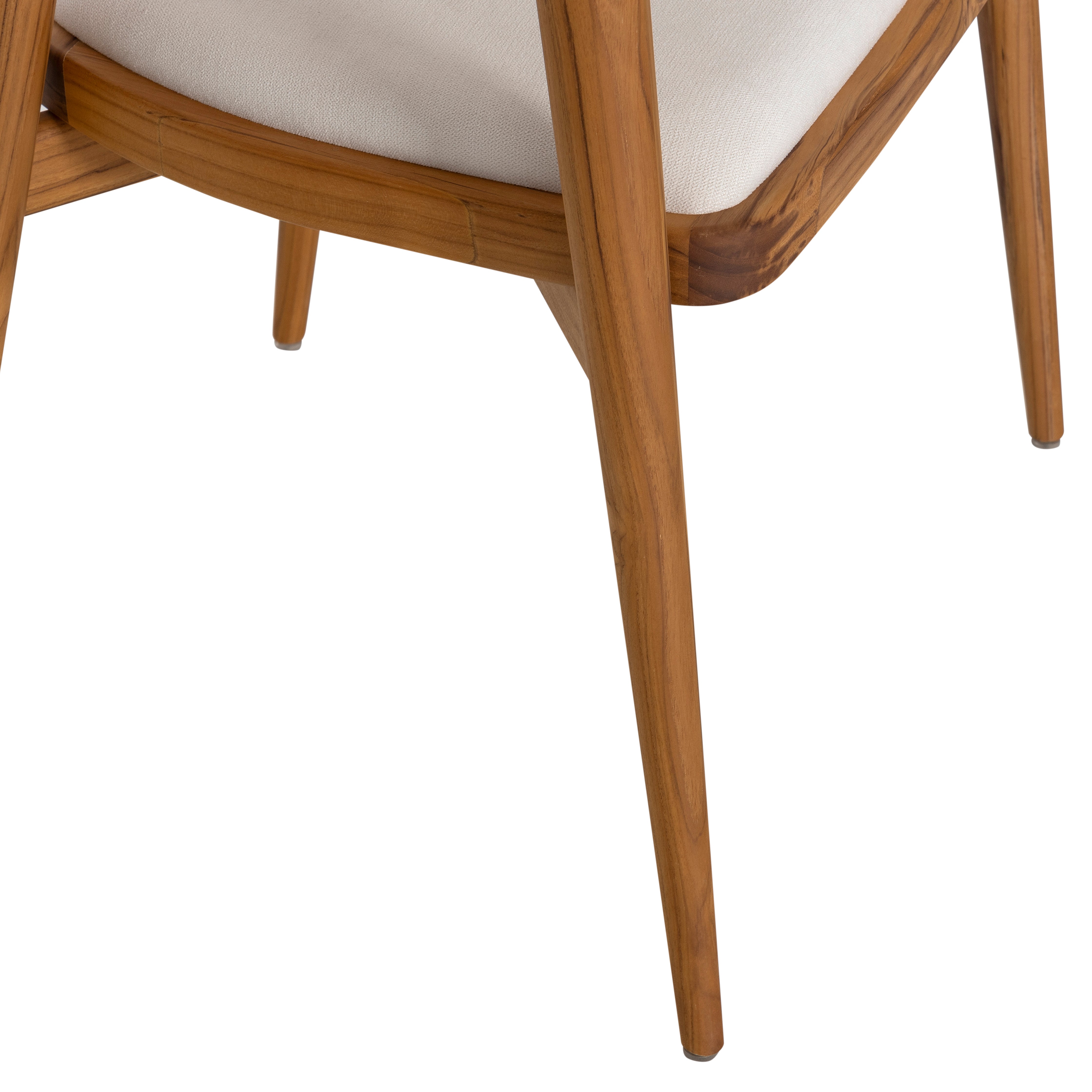 Close-up of a wooden chair with a white cushioned seat on a white background